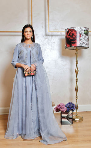 A blue grey kalidaar lehenga gown with its dramatic presence.