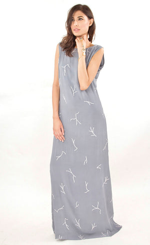 This is our simple and elegant straight gown. It is intricately hand embroidered with silk threads and beads all over. This understated mineral grey gown is perfect example of minimalistic beauty and hence best for you to glam up any occasions.
