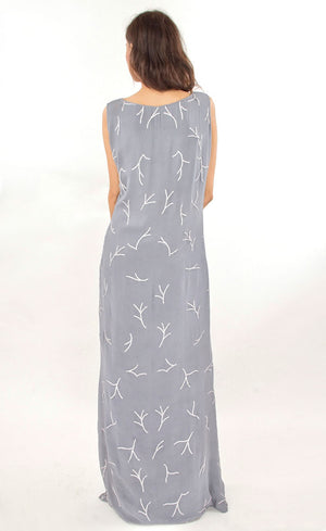 This is our simple and elegant straight gown. It is intricately hand embroidered with silk threads and beads all over. This understated mineral grey gown is perfect example of minimalistic beauty and hence best for you to glam up any occasions.