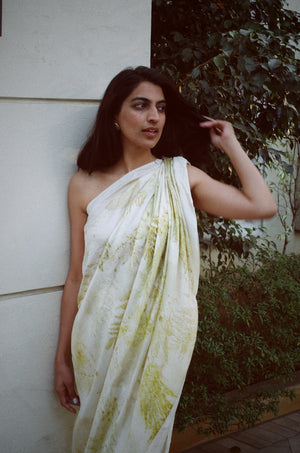 Eco Printed Sarong   Style Code: JBSS23C04  Details:   Hand-printed by using natural leaves from the forest on hand-woven pure mulberry silk.   100% Mulberry Silk   Sarong drape can be worn over any inner short top and bottoms/shorts. Ideal for a beach-side dinner or a pool party.   Hand-printed in Chandigarh, India