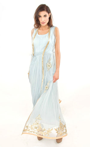 The muse here is wearing our floor length gown with an embroidered gilet / jacket. Embracing the era of comfort this dress is nothing short of luxury and glamour. It is a silk chiffon gown with a tulle net jacket overalls which is fully embroidered in our signature gota appliqué, silk threads, beads and sequins embroidery on the front and pressed gota at the border.