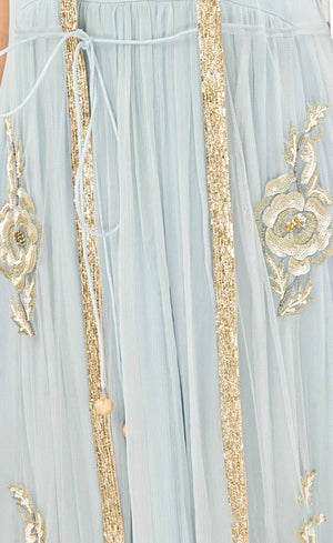 The muse here is wearing our floor length gown with an embroidered gilet / jacket. Embracing the era of comfort this dress is nothing short of luxury and glamour. It is a silk chiffon gown with a tulle net jacket overalls which is fully embroidered in our signature gota appliqué, silk threads, beads and sequins embroidery on the front and pressed gota at the border.