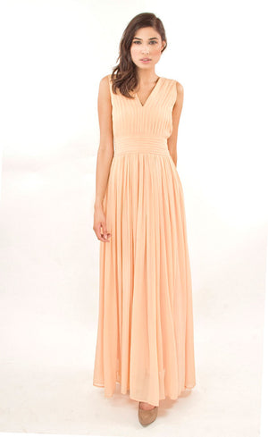 This nude elegant flowy floor-length gown has simple v-neckline bringing out a certain amount of boldness and self assurance. It is pin-tucked at the yoke and waistline making it an ideal go-to gown for any evening cocktail event.