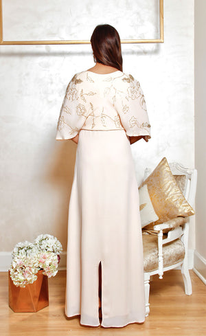 Back slit into this silhouette providing an ease of comfort for you to comfortably lounge into it.