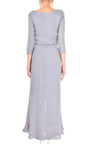 This is our alluring sandstone grey front slit dress. The lightweight drapey georgette makes it ideal to wear for any occasion. This is flattering full sleeved front slit dress with a beautiful buttoned sweetheart neckline giving you the perfect bloom when worn. It is ideal for business evening dinners/cocktail parties & formal events giving you all the attention you deserve.   