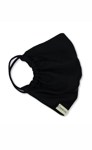 Black face mask with a brand label on a white background