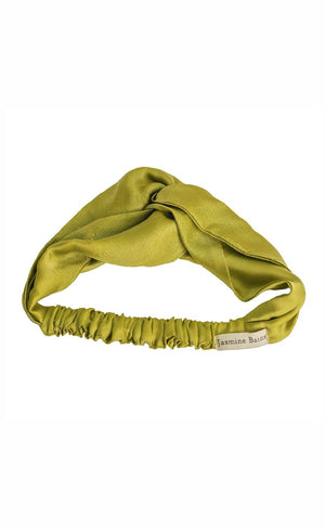 Close-up of green satin knotted headband knot detail, handcrafted by Jasmine Bains