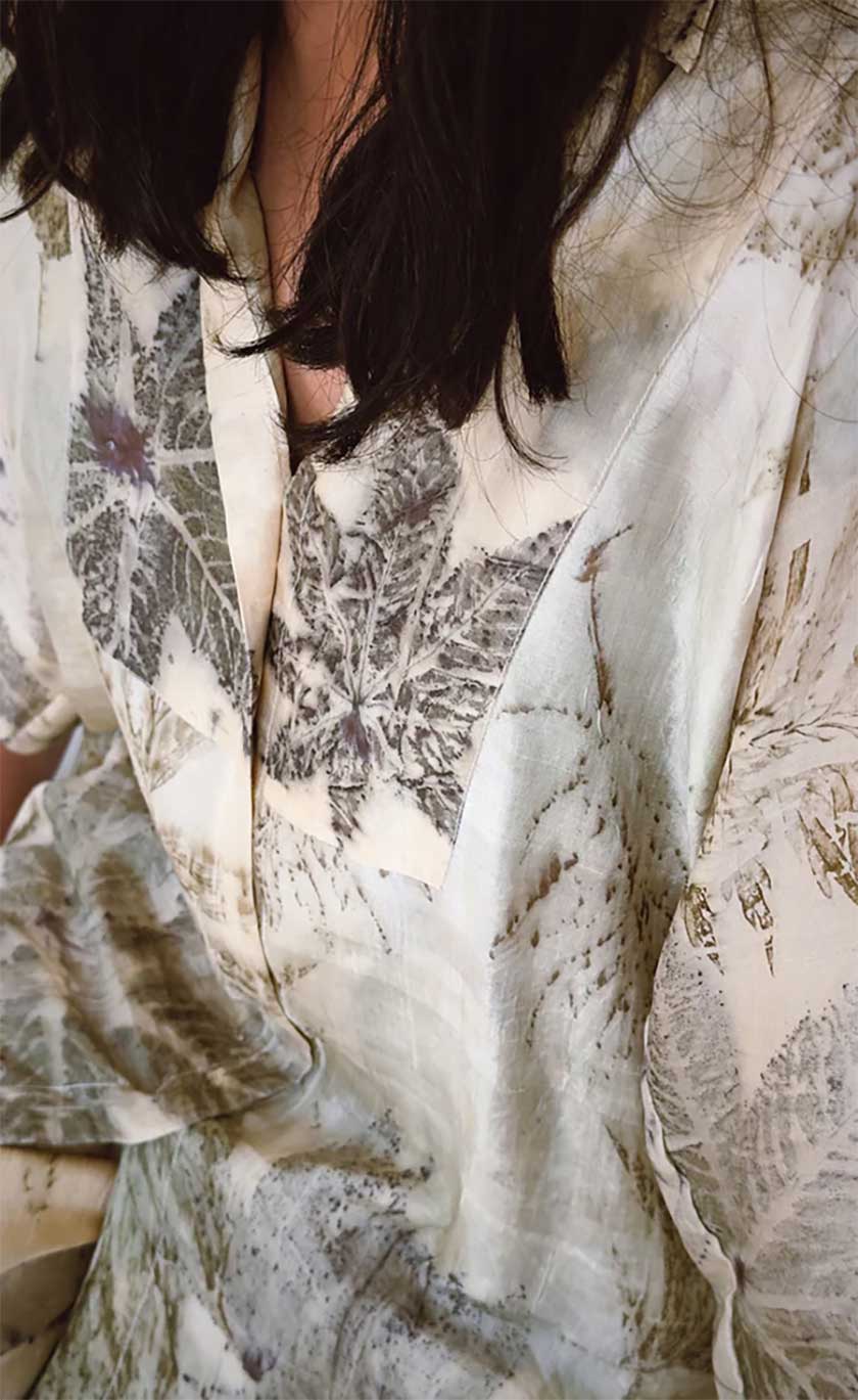 A model wearing an eco printed patterned naturally printed shirt / co ord set 