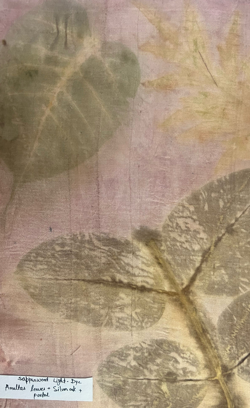 Light sappanwood-dyed mulberry silk with leafy eco-printed motifs, handmade in Chandigarh, India