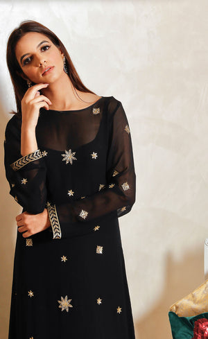 Stay gold with our beautiful starry night embellished embroidery onto this floor length silk georgette gown.