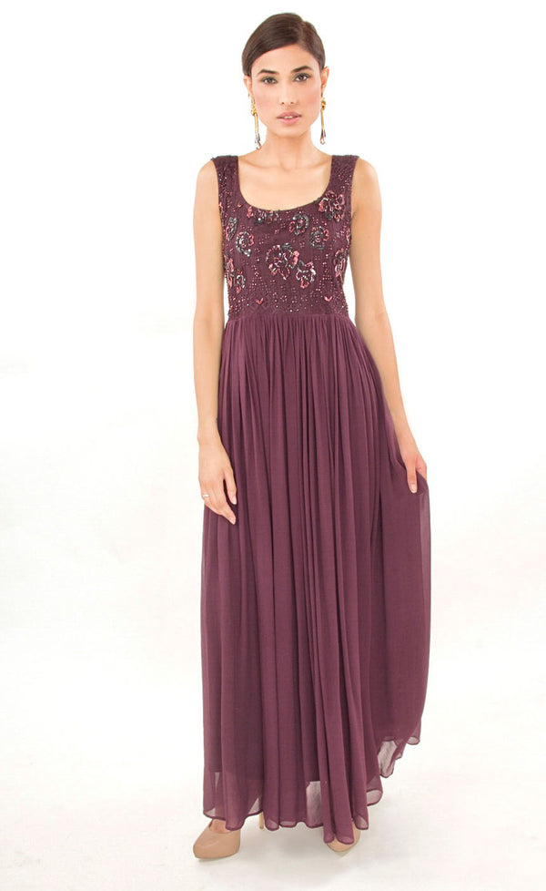 The muse here is wearing our naturally beautiful and elegant burgundy gown with laced yoke which is beautifully highlighted with beads as well as sequins and is gathered around the waistline providing the perfect amount of flounce, further enhancing the look and uniting comfort with elegance.