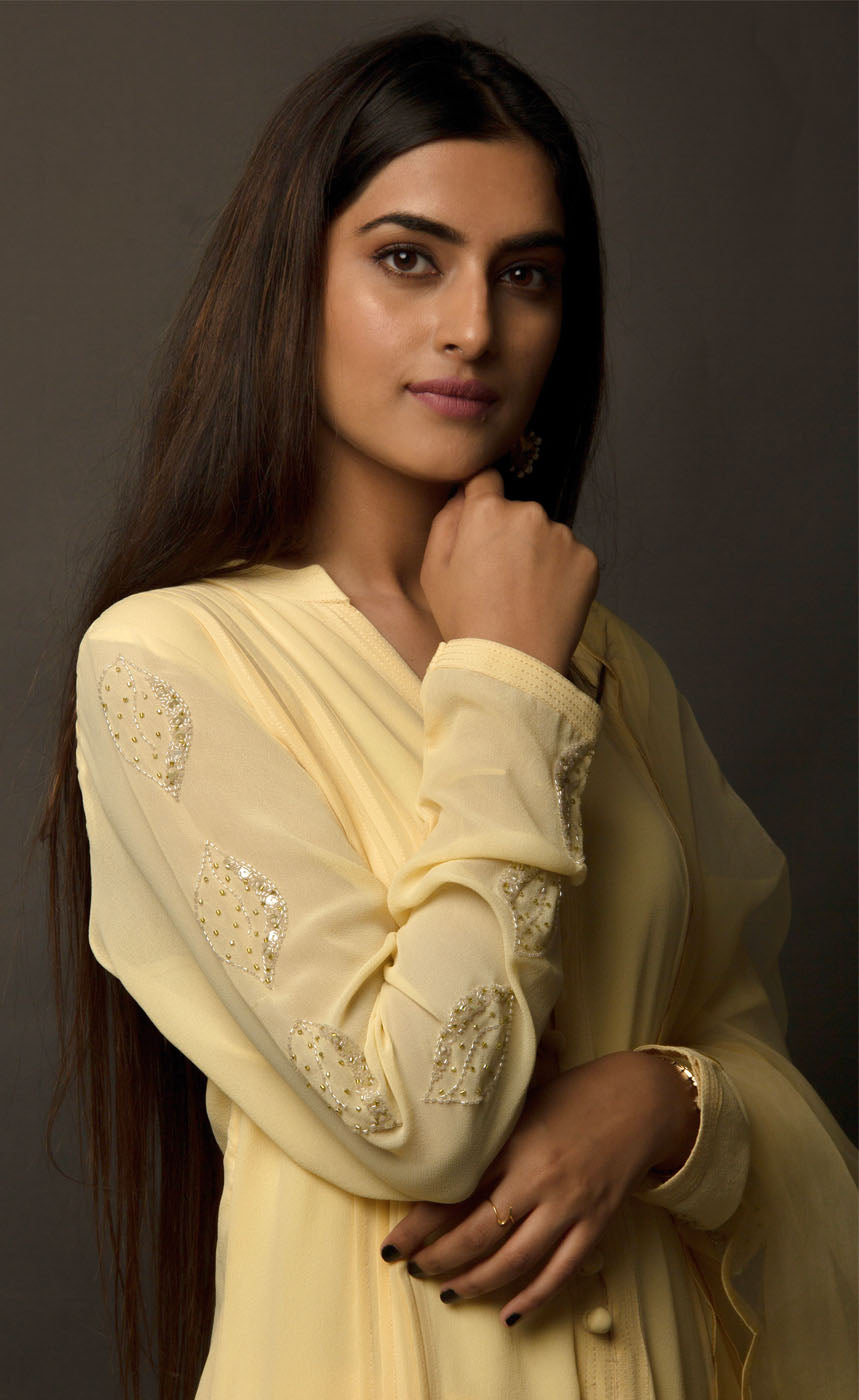 One of our favourite styles - This collection took its name 'classic minimalism' while this particular piece was being crafted. This kurta set (the very first piece to be crafted in this collection), flaunts its chic style with its embellished details along the length of the sleeves, a beautiful modern take on it. It carries many intimate details such as anchor thread being carefully stitched on the loop buttoned placket neckline and across the slim cuffs, definitely making it a wardrobe essential.