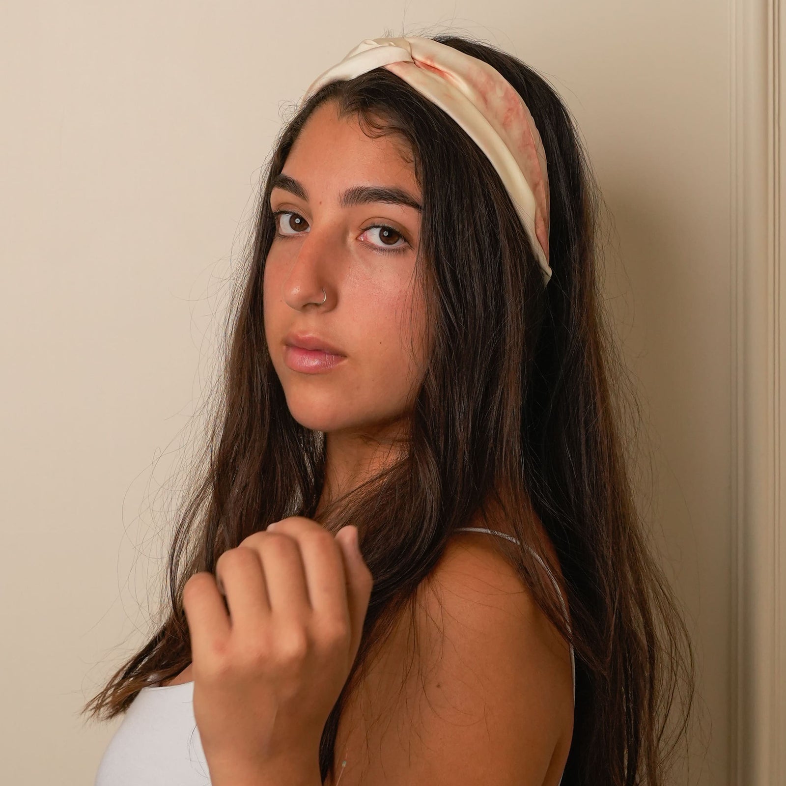 Elegant mulberry silk headband in marble-rust.
