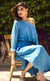 All eyes will be on you in this mykonos blue, exquisitely detailed one off shoulder dress. This dress features an elegant and effortlessly trendy one off shoulder neckline, carefully embroidered with beads and sequins giving a subtle and sophisticated look that exudes glamour. It has full sleeves that are gathered around the cuff, slightly ruched drawstring insertion along the waistline and a high slit at one of it's sides making this dress suitable for any occasion. 