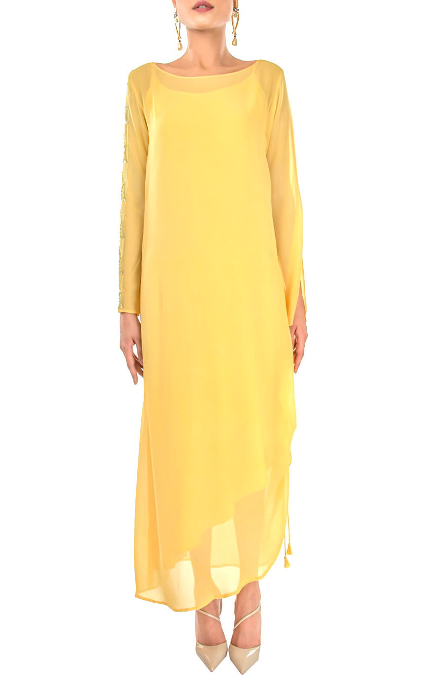 This is our tuscan yellow side drawstring dress which has all the flowy vibes which is a perfect dress for any event, bearing bead-work embroidery vertically on one sleeve and slit on the other to reveal your little glam and sparkly mood making it a beautiful lounge or an evening wear. The dress further has adjustable drawstring at one of it's sides providing a simple and elegant look.