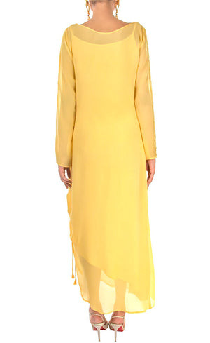 This is our tuscan yellow side drawstring dress which has all the flowy vibes which is a perfect dress for any event, bearing bead-work embroidery vertically on one sleeve and slit on the other to reveal your little glam and sparkly mood making it a beautiful lounge or an evening wear. The dress further has adjustable drawstring at one of it's sides providing a simple and elegant look.